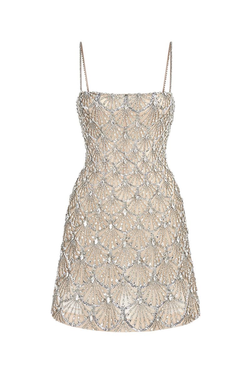 Le Thanh Hoa seashell silver beaded mini dress with intricate detailing, perfect for stylish summer occasions.