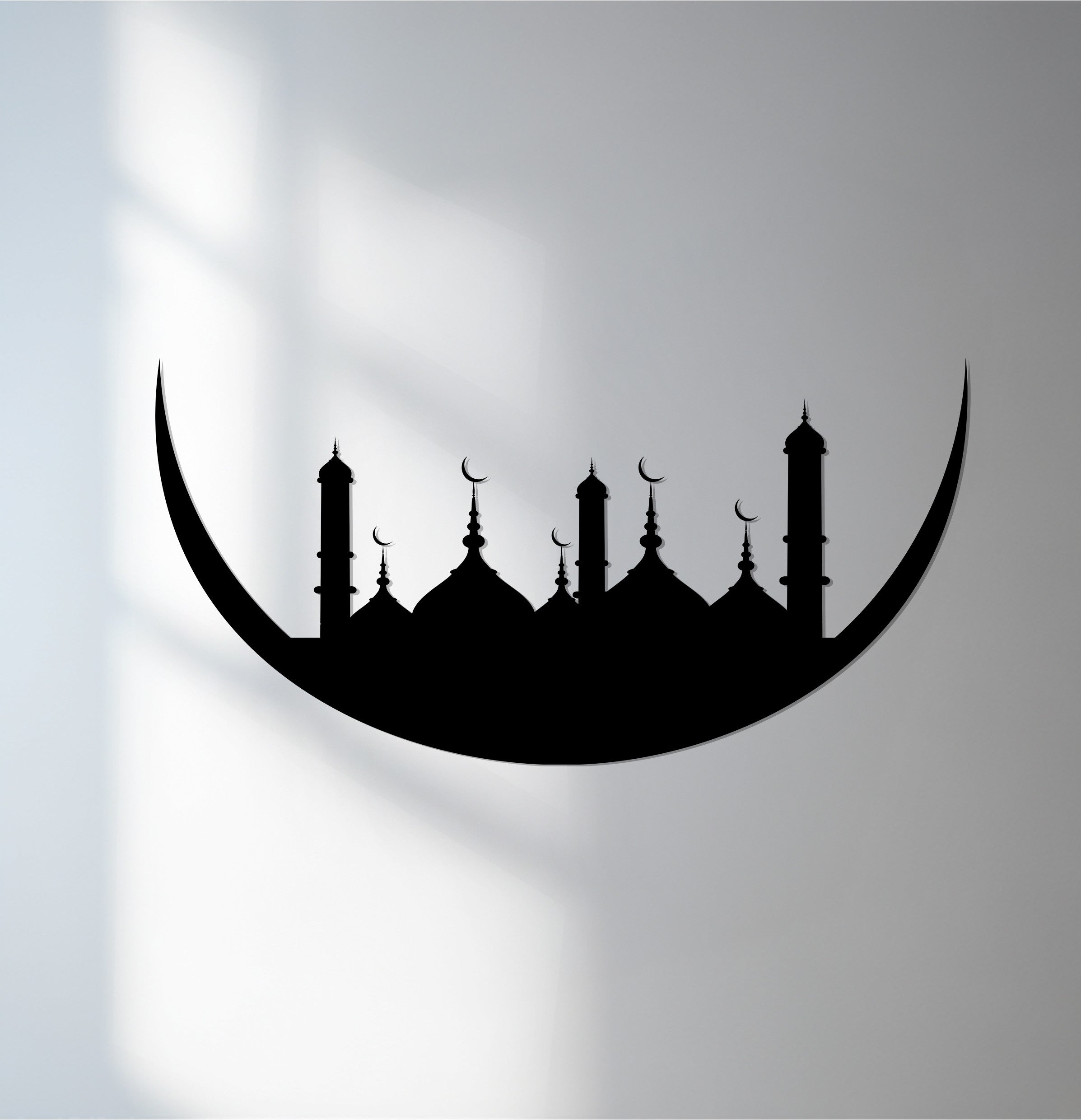 Crisply-defined edges showcase this crescent moon mosque silhouette in our Islamic metal wall decor, adding a modern flair to the border of your home.