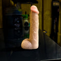 Bold penis-shaped resin shift knob with realistic skin tone finish. Weighted, ergonomic, and fits most manual and automatic cars with included adapters.