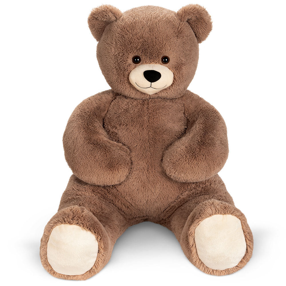 Large brown plush teddy bear sitting upright with cream-colored paw pads and a stitched smiling face.